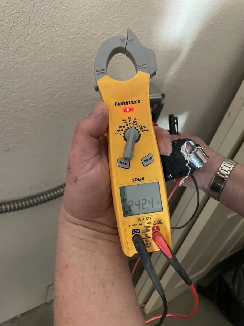 Voltage testing with clamp meter during Hot Tub / Pool Electrical Wiring in Claiborne